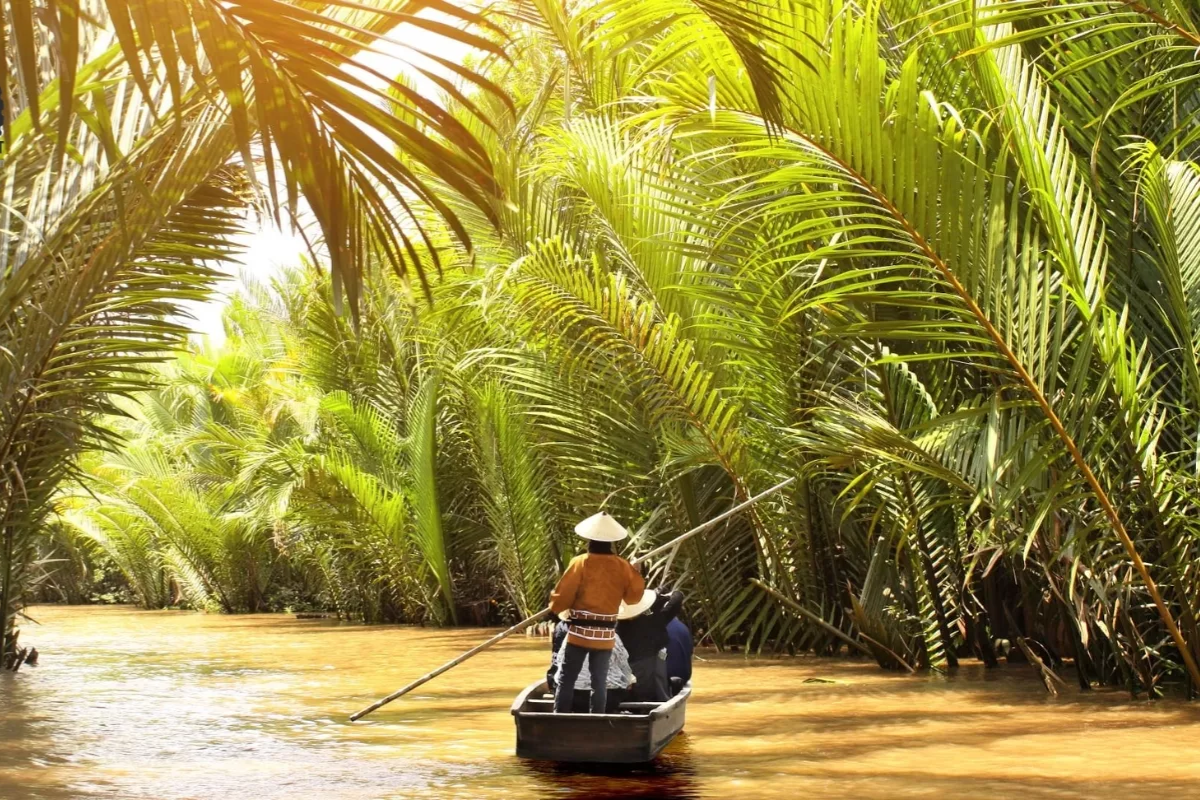 Boats navigating the rivers in the Mekong Delta, Southern Vietnam